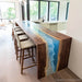 Modern ocean wave epoxy waterfall table as a luxury office centerpiece