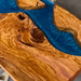 Modern resin bar height table with natural olive wood