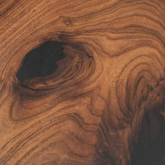 Close-up of a wooden surface with visible grain and texture