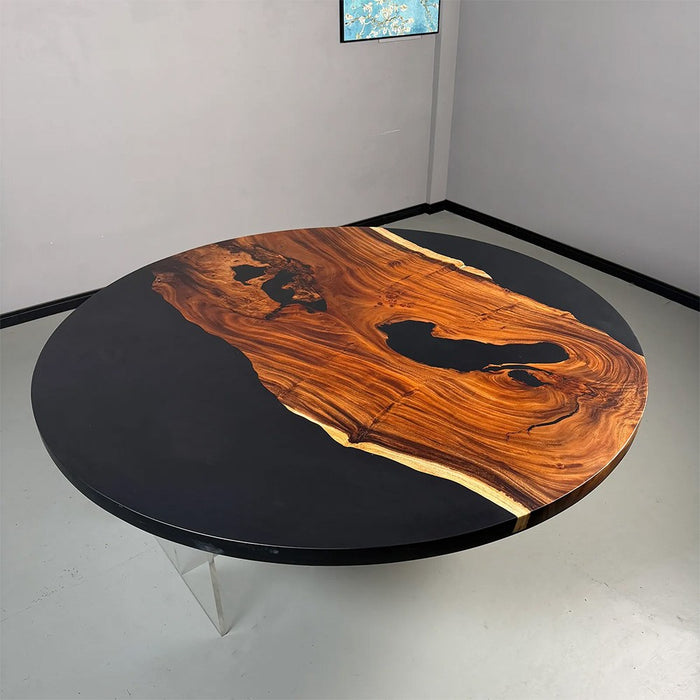 modern round walnut dining table featuring black resin