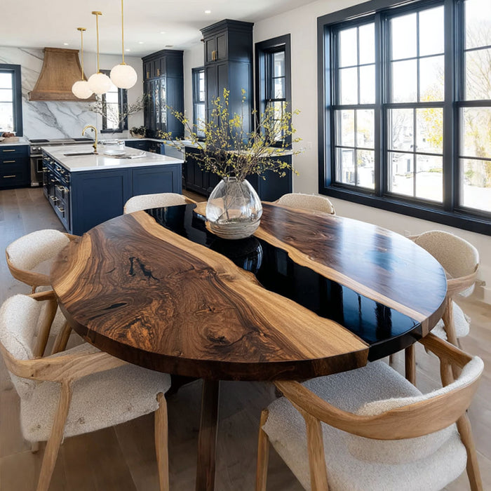 Dining area with a wooden table and chairs in a modern kitchen.