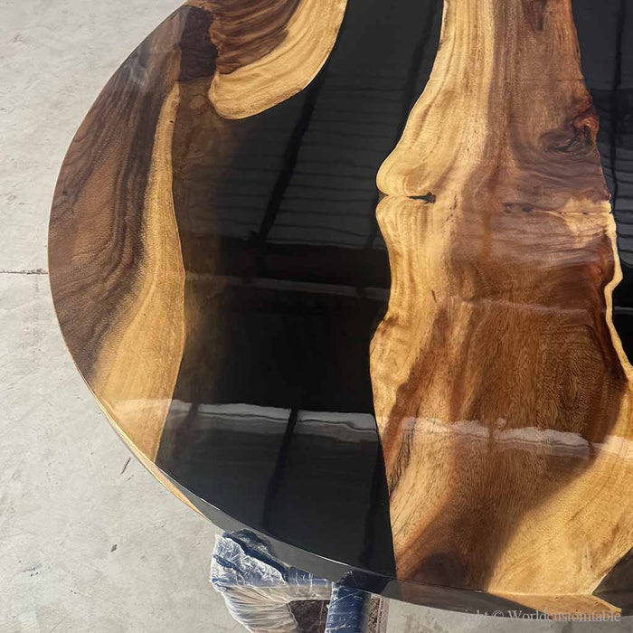 Designer round coffee table blending wood grain and epoxy resin