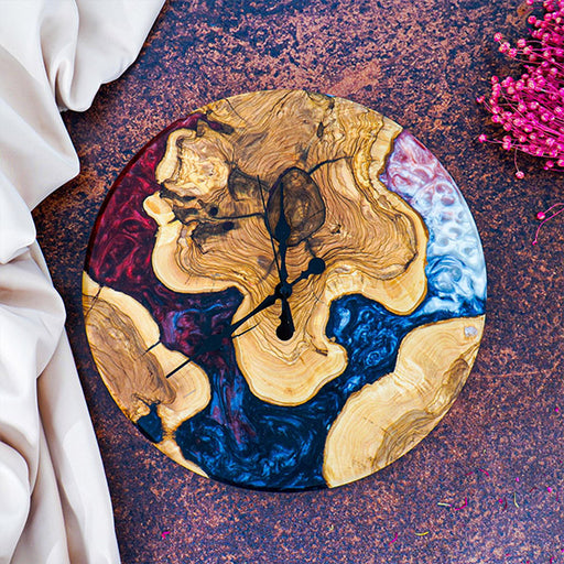 Modern rustic epoxy wood clock with swirling multicolor resin