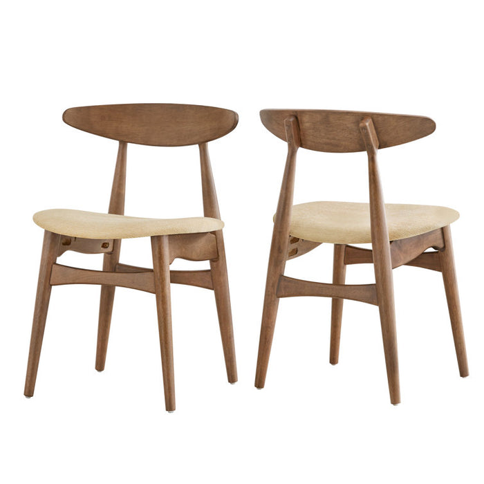 Two wooden chairs with beige seats on a white background