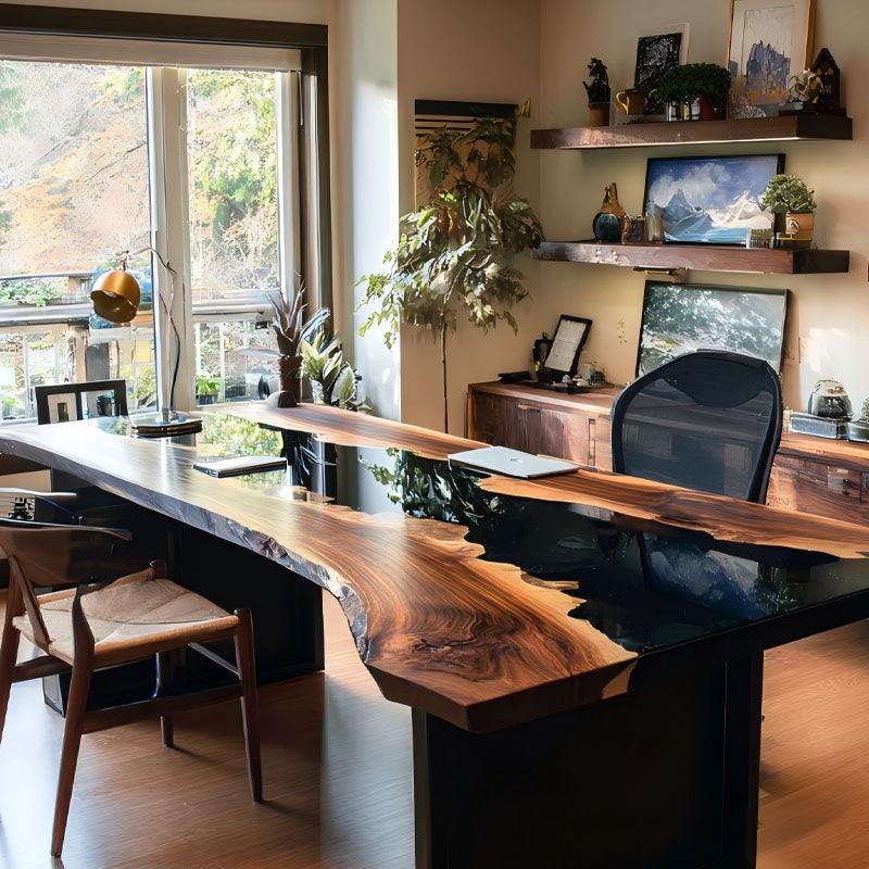 Modern office with a long wooden desk, chairs, and decorative elements.