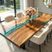 Modern walnut dining table with green epoxy swirl river detail