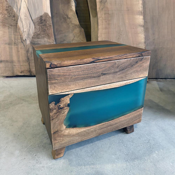 Modern walnut epoxy nightstand enhancing bedroom decor.