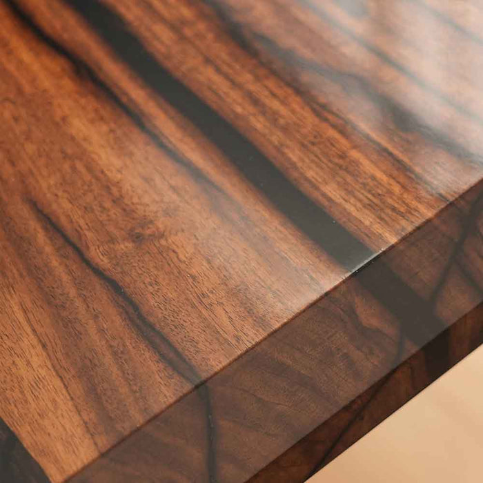 Close-up of a wooden surface with a glossy finish