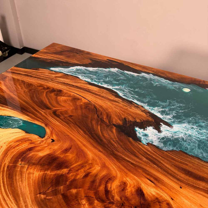 Wooden table with a resin-embedded ocean design