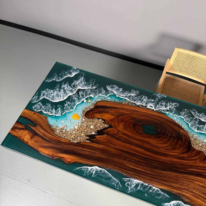 Wooden surface with a design resembling a beach scene with waves and sand.
