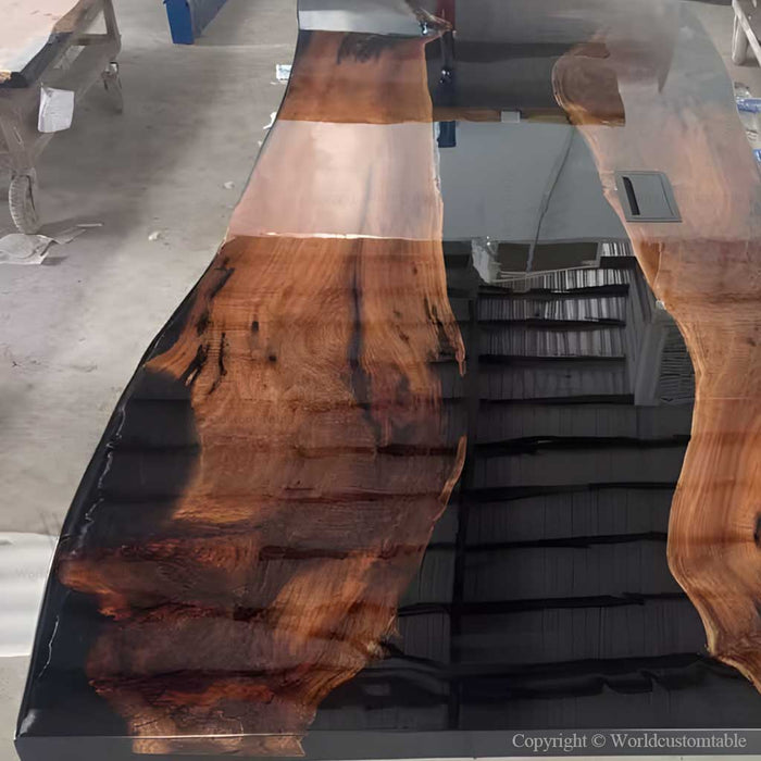 Modern walnut river table with built in charging station for conference rooms and offices