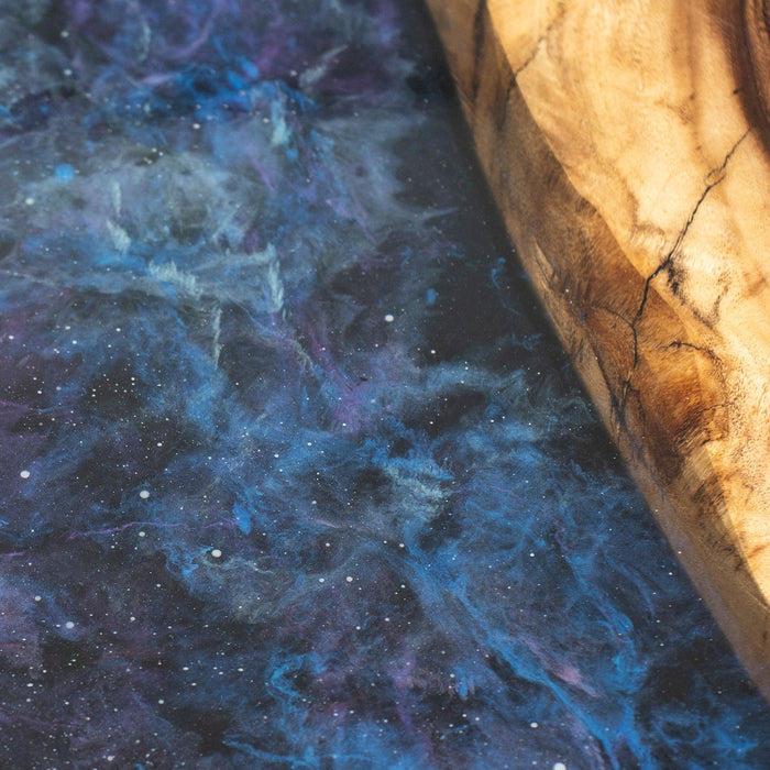 Modern walnut wood dining table with starry sky epoxy resin accents and live edges.