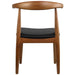 Wooden chair with a black seat on a white background