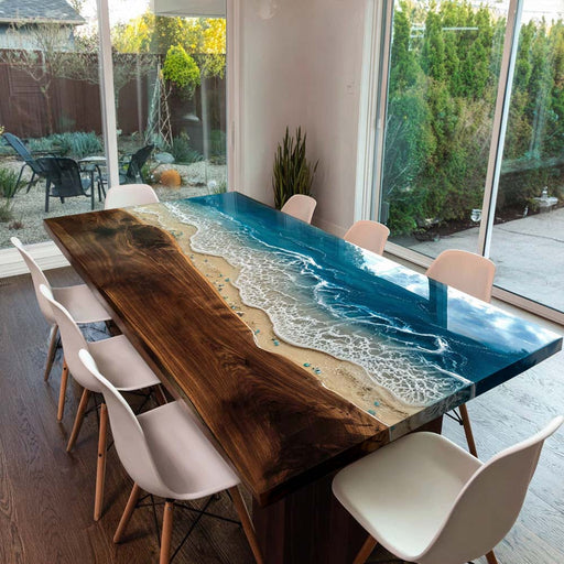 Dining table with beach-themed design in a modern interior setting