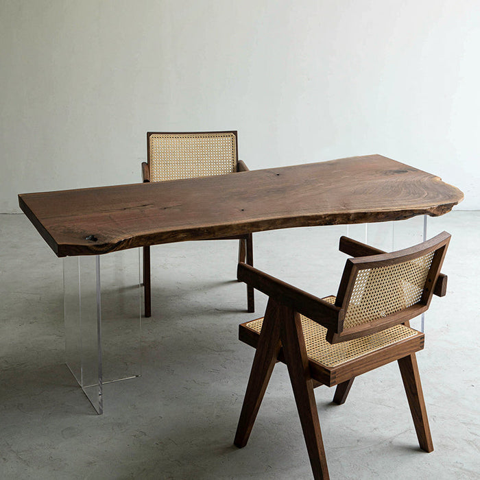 Natural edge black walnut wood table showcasing raw wood beauty and asymmetric design