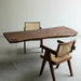 Natural edge black walnut wood table showcasing raw wood beauty and asymmetric design