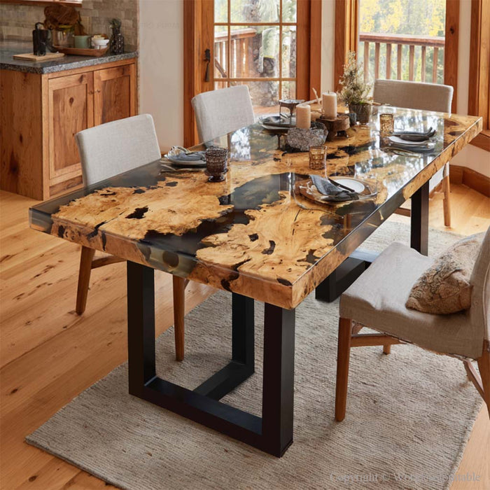 Natural olive wood grain highlighted by translucent gray epoxy