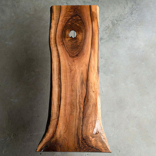 Natural solid wood dining table with unique grain patterns