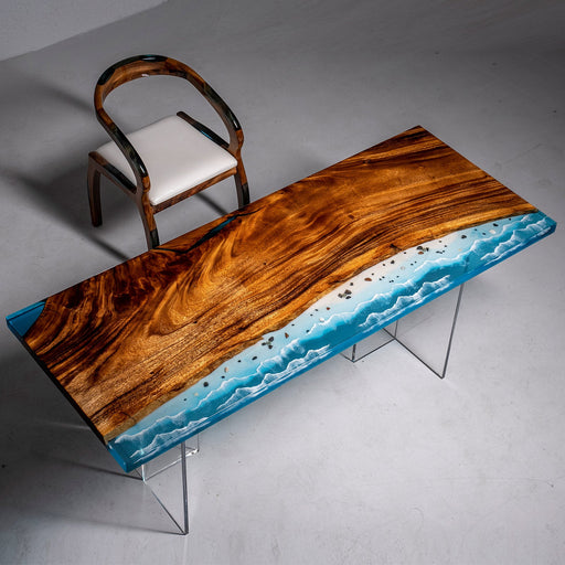 Resin table with natural wood slab and shore-inspired epoxy art