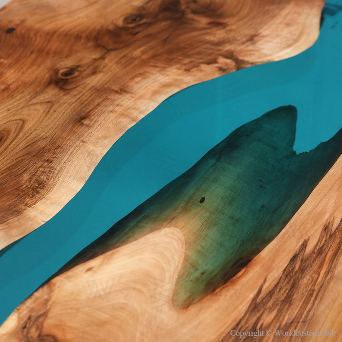 Natural wood epoxy dinning table styled in a modern home setting