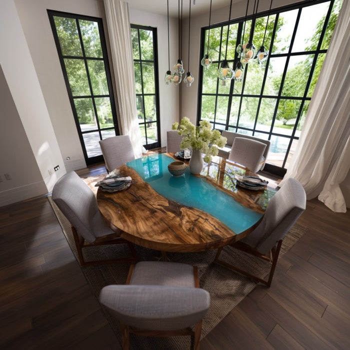 Dining room with a unique table design featuring a wooden top and blue glass base.