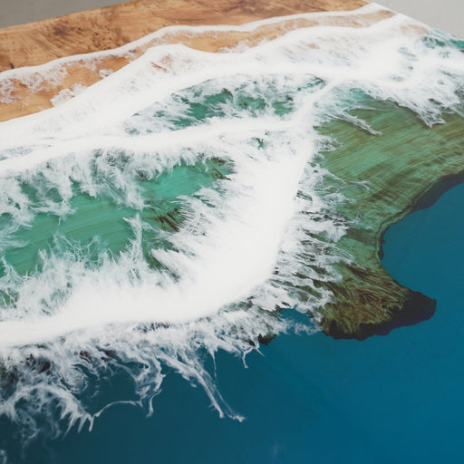 Ocean blue epoxy river table for dining room.