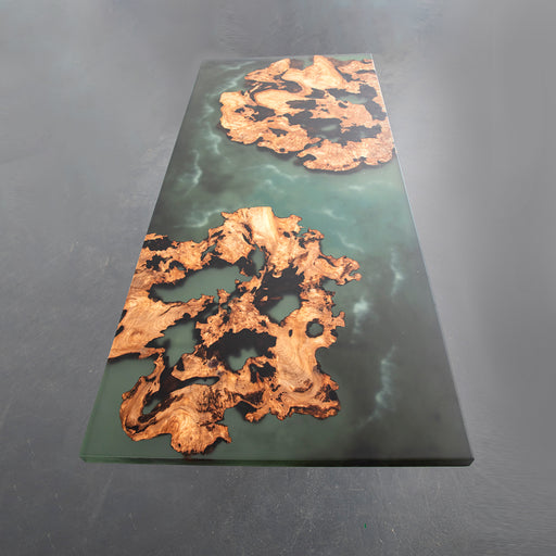 Dreaming of a statement kitchen island that feels like a floating island at sea? This Ocean Epoxy Ice Table fuses rare burl wood slabs with translucent, ocean-inspired resin. A perfect blend of practicality and design, it turns your kitchen space into a gallery-worthy interior.