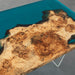 Ocean-inspired epoxy and burl wood desk for luxury interiors
