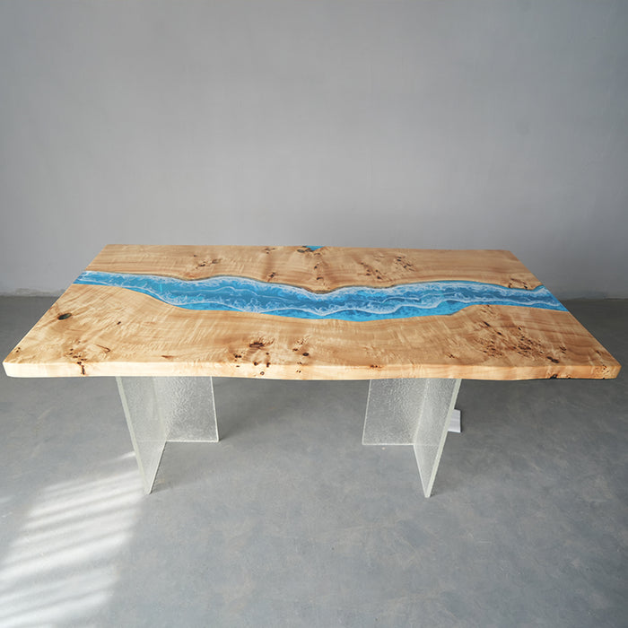 Modern handcrafted resin dining table with ocean wave design, seats 6-8, limited stock.