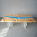 Modern handcrafted resin dining table with ocean wave design, seats 6-8, limited stock.