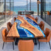 Handcrafted walnut dining table featuring deep blue epoxy waves and a realistic ocean-inspired design