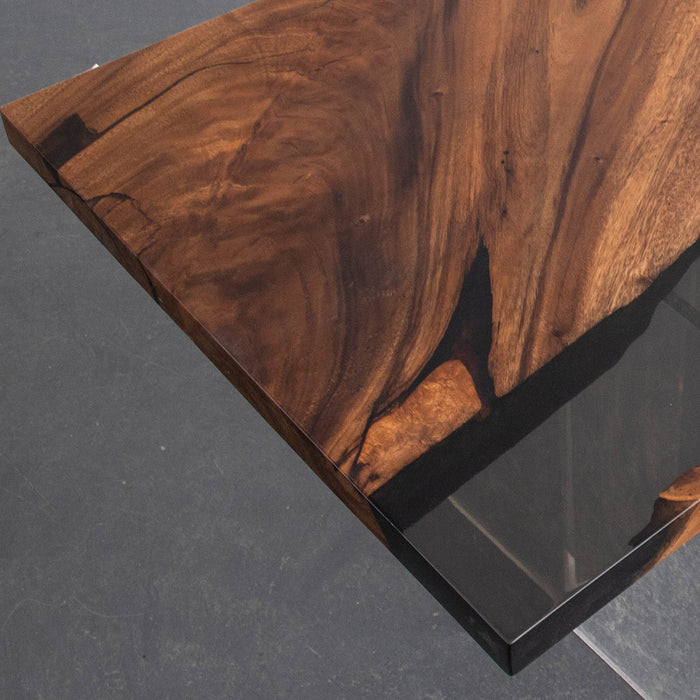 Wooden table with a dark finish on a gray background
