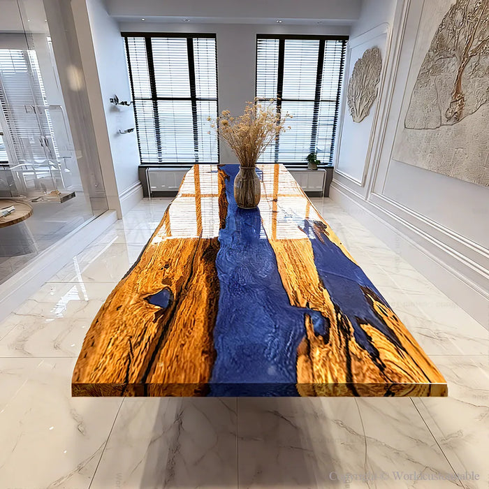 Handcrafted live edge olive wood blue epoxy river dining table with glossy finish, custom resin table made in California.
