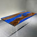 Table with blue resin and wooden design on a gray floor