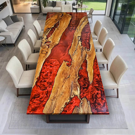 Handmade dining table crafted from natural olive wood and vibrant red epoxy resin