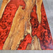 Executive conference table made from olive wood and red resin