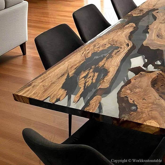 Close up of olive wood grain with smoky gray epoxy resin