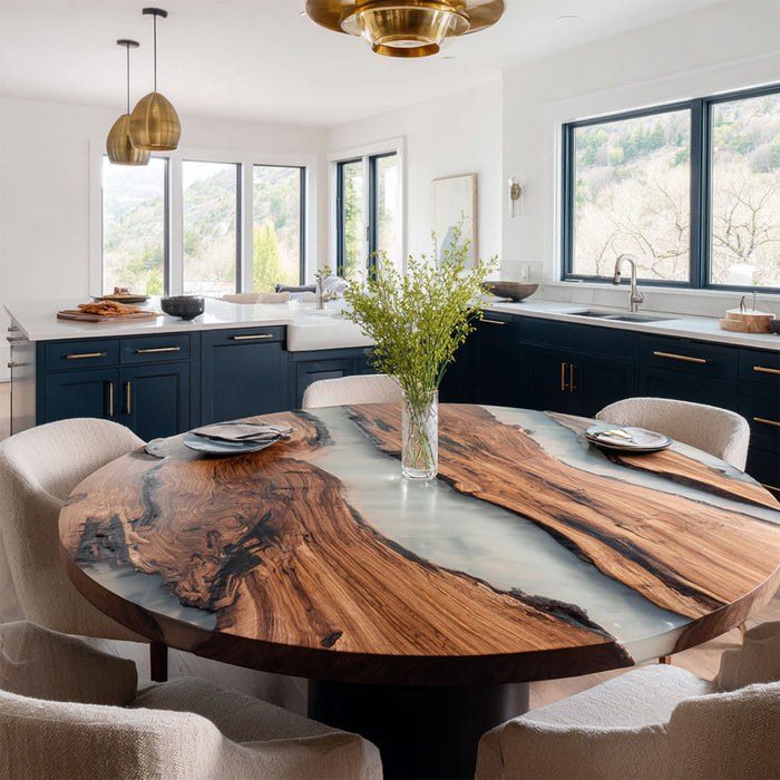Modern kitchen with a wooden dining table and chairs.
