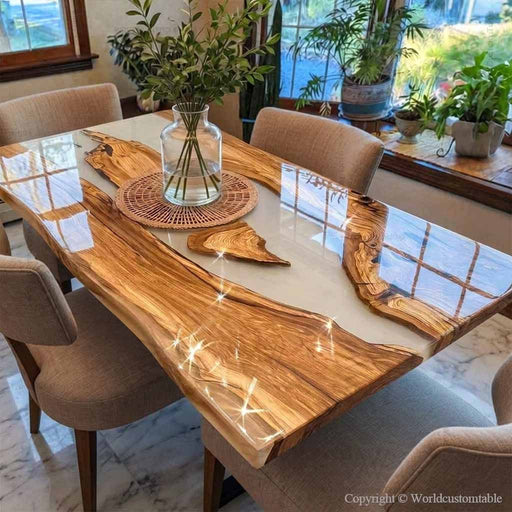 Luxury olive wood and white resin river dining table in modern interior setting with elegant chairs