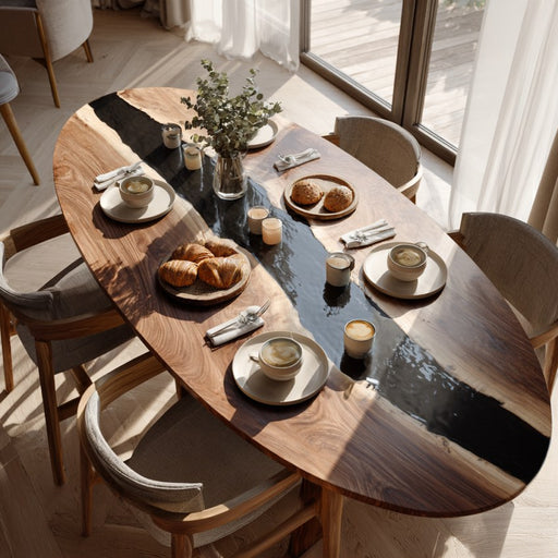 Dining table set with bread, cups, and plates in a bright room.