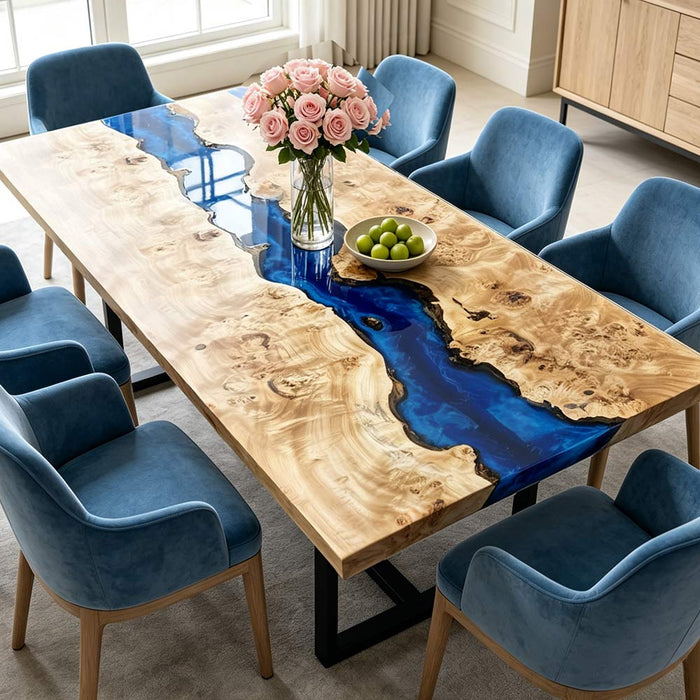 Natural poplar burl dining table with flowing blue epoxy resin river, showcasing unique wood grain