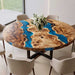Top view of a luxury Poplar Burl wood and blue epoxy resin round dining table.