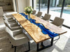 Live-edge poplar burl dining table with flowing blue epoxy resin river, seats 8-10 people