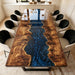 Overhead view of a one-of-a-kind blue resin art table featuring reclaimed poplar wood.