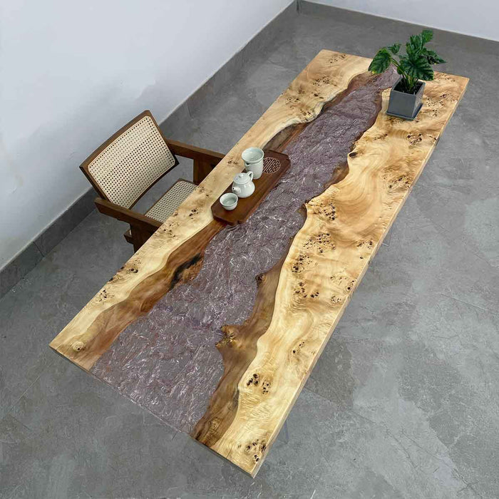 Angled shot highlighting the transparent “ice crystal” resin and smooth poplar wood edges of the S71 coffee table.