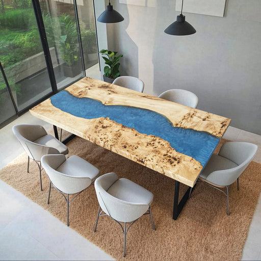 Handmade poplar wood dining table with blue epoxy river and live edge design