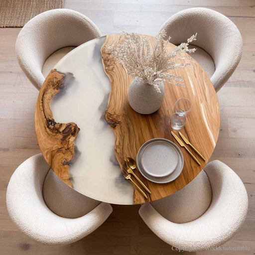 Custom round poplar wood dining table with white epoxy resin river design.