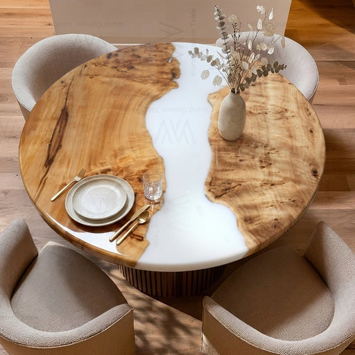 Custom round poplar wood dining table with white epoxy resin river design.