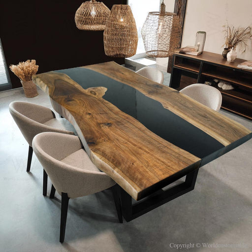 Dining table with wooden surface and black resin in a modern interior setting