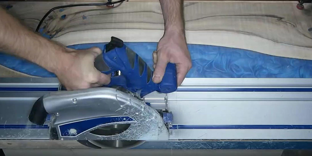 Carefully demolding the cured epoxy river table from mold
